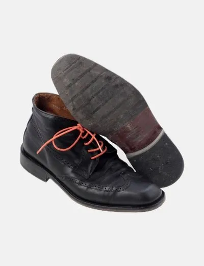 Black lace-up ankle boots